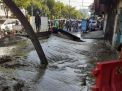 Proyek pergantian Pipa, Muncul Luapan Lumpur Jebolkan Jalan Beraspal