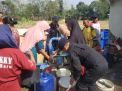 Brimob Kompi 3 Batalyon C Pelopor Satbrimob Polda Jatim Salurkan Air Bersih di Desa Sumberharjo