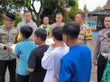 Kabid Humas Polda Jabar : Polisi Bagikan Ratusan Nasi Kotak dan Puluhan Paket Sembako