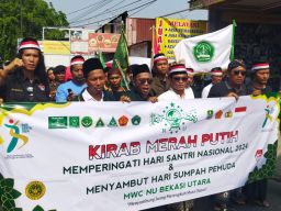PNIB Pagar Nusa dan MWC NU Bekasi Utara Gelar Kirab Merah Putih Rayakan Hari Santri Nasional 2024 dan Sumpah Pemuda